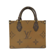 Thumbnail of Gold Canvas Louis Vuitton Handbag - Image 2