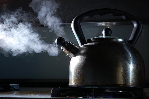 water kettle with steam coming out 