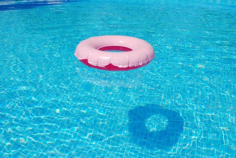 pink floater on pool