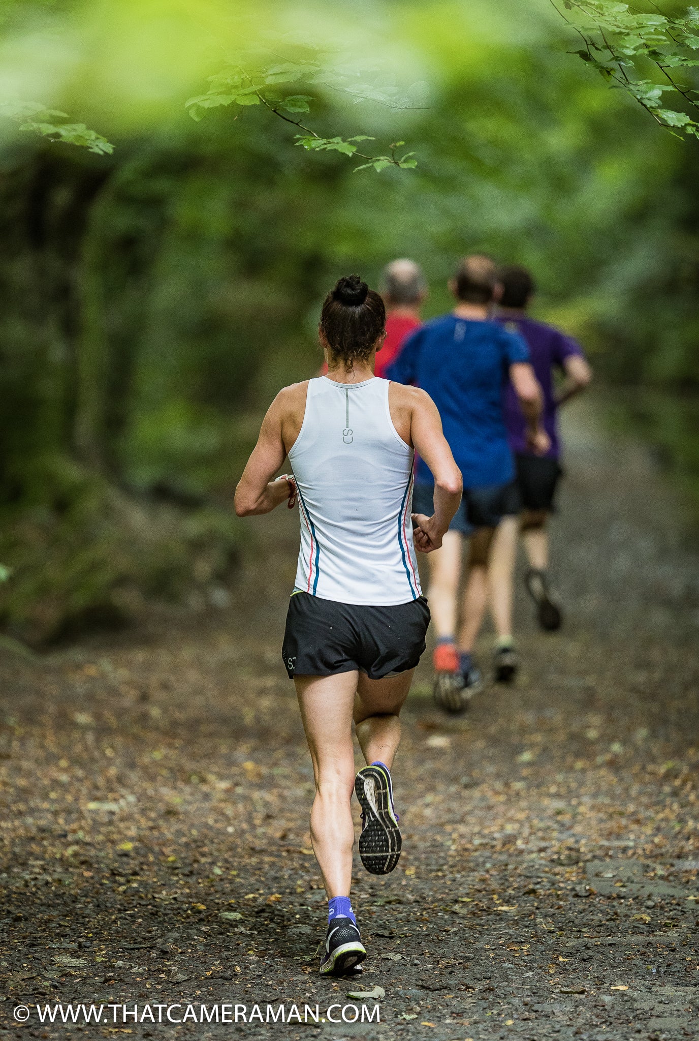 Athletes Racing in Sundried Running Vest and Recycled 2 in 1 Shorts