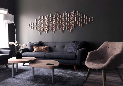 Mutifamily model suites get wall art that moves and tables with tactile elements