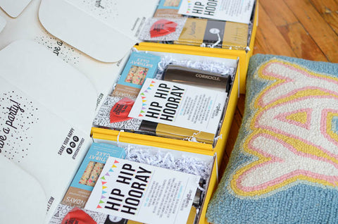 open gift boxes lined up in a row with Hip Hooray Greeting Cards by a Yay Pillow: Best Ideas for Work From Home Employees