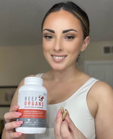 Influencer showing Beef organ supplement by One Earth Health