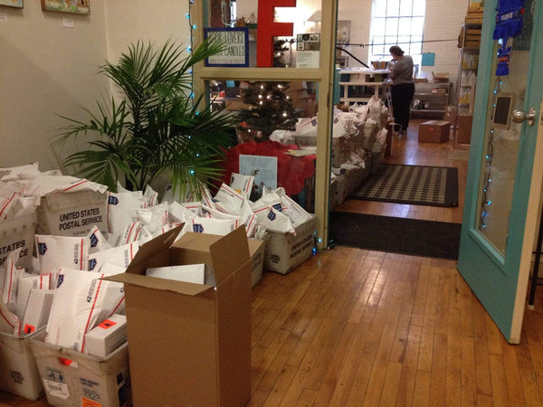 Piles of holiday orders ready for pickup
