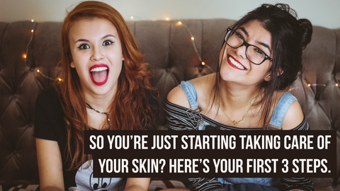 Two woman of fair skin tone sitting side by side on a ouch smiling and looking shocked