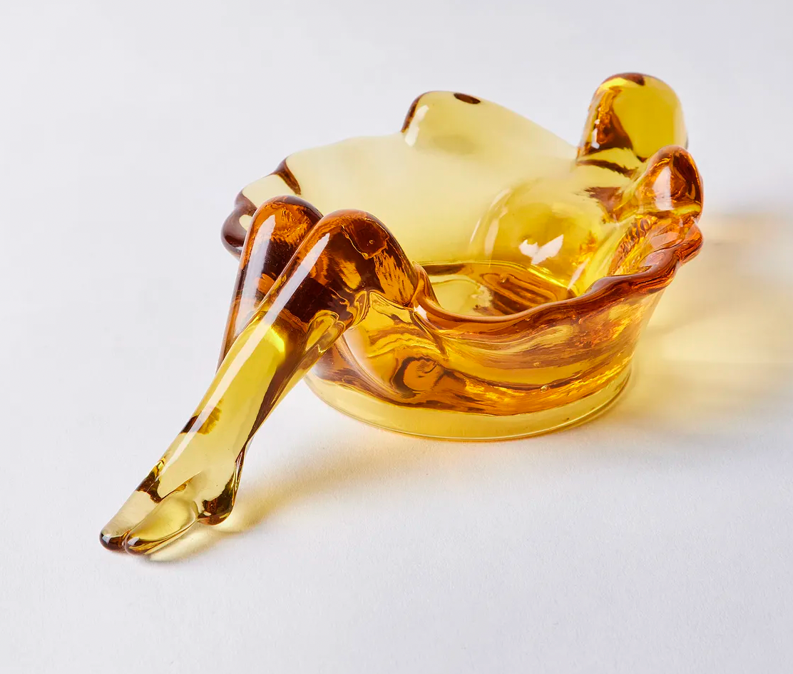 Hand-pressed amber colored glass soap dish
