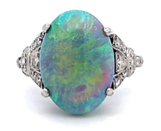 Green, blue and purple art deco opal diamond ring on a platinum setting