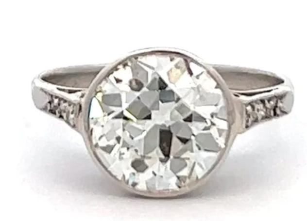 2.27 carats art deco old european cut diamond bezel set ring on a platinum setting