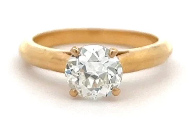 Mid century 1.51 carats old european cut diamond on a gold setting