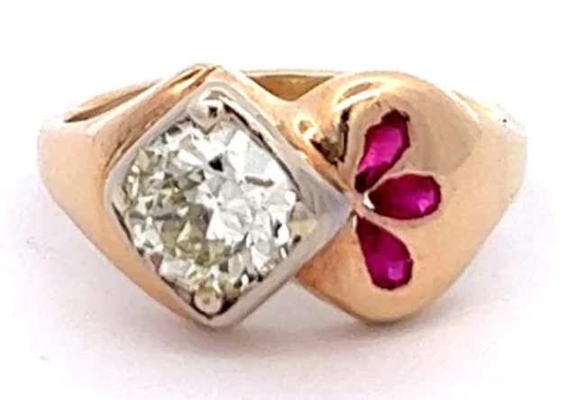 Retro old european cut diamond and ruby ring on a yellow gold setting