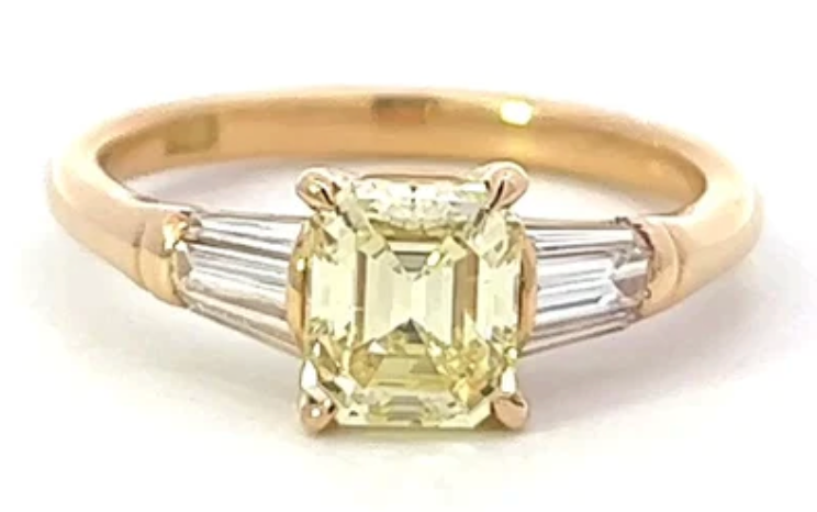 Vintage 1.13 carat fancy yellow diamond on a 18 karat yellow gold setting