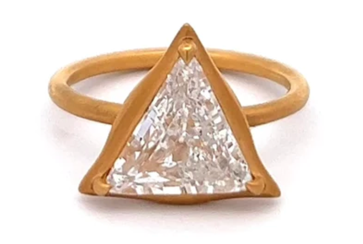 2.45 carat triangular step cut diamond on a 18k yellow gold solitaire band
