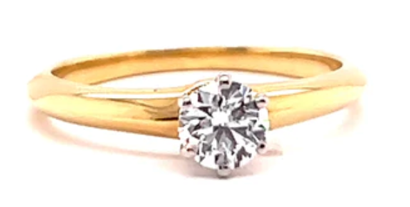 Vintage tiffany and co 0.42 carat diamond on a yellow gold setting 