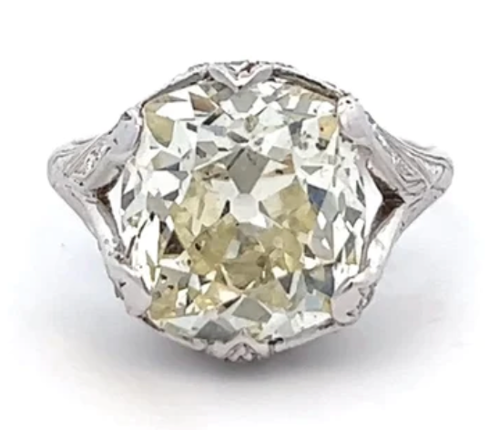 7.60 carat old mine cut diamond ring on a platinum setting