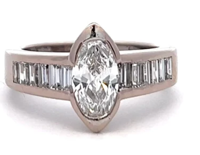 1.04 carat oval cut diamond on a white gold setting 