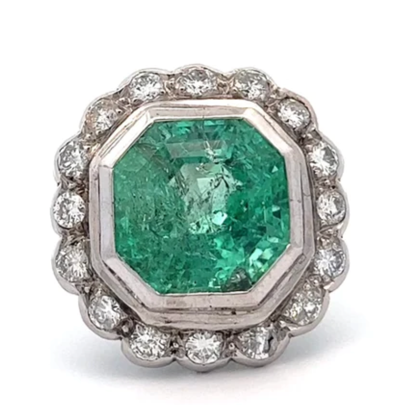 Vintage colomobian emerald diamond cluster cocktail ring on a 14k white gold setting