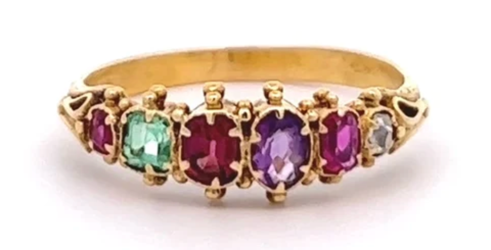 Victorian gemstone acrostic ring spelling out "regard" with the first letter of each gemstone on a 14k yellow gold setting