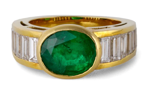 Vintage emerald diamond on a 18k yellow gold bezel setting