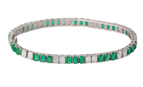 Diamond emerald tennis bracelet on 14k white gold