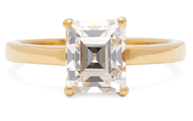 1.50 carat emerald cut diamond solitaire ring on a 18k yellow gold setting