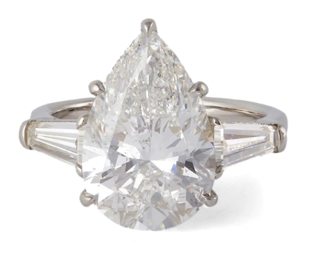 GIA 6.12 carat pear cut diamond ring on a platinum setting 