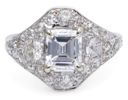 1.58 carat emerald cut diamond cluster ring on a 18k white gold setting