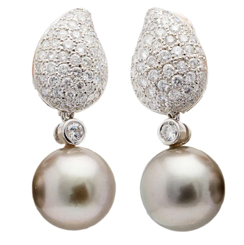 Vintage pearl and diamond day to night ear clip earrings on a 18k white gold setting