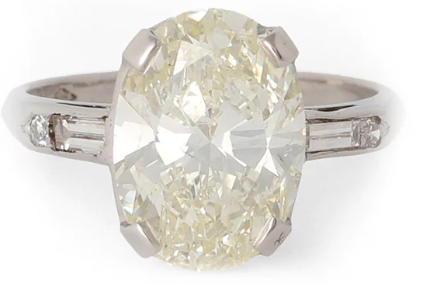 Mid century 5.09 carat oval cut diamond on a platinum setting