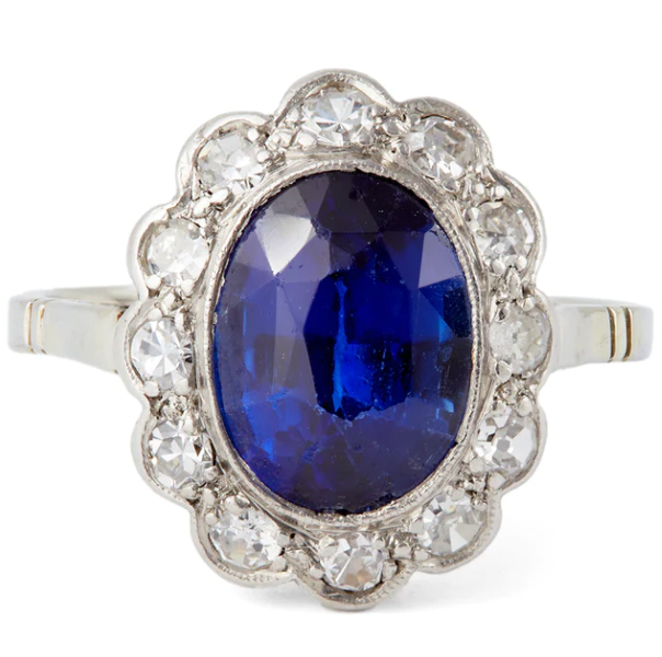 Art Deco synthetic sapphire diamond cluster ring on a white gold setting