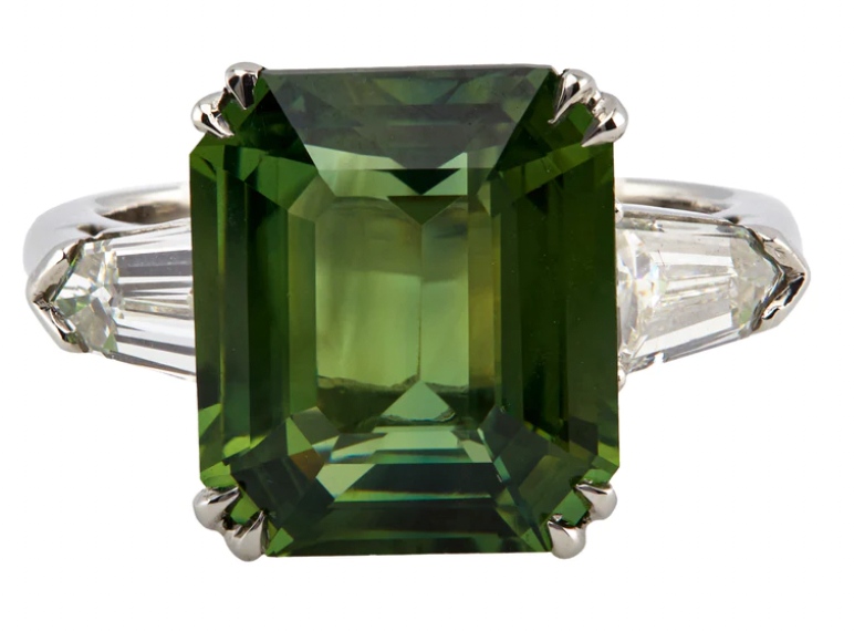 7.03 carat yellowish green sapphire on a platinum setting