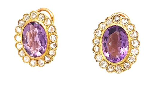 Amethyst and diamond cluster earrings on a gold setting