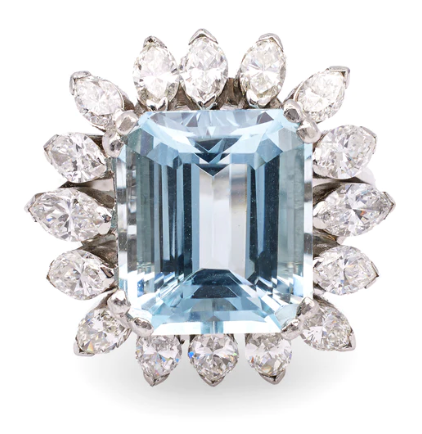 Aquamarine and diamond cluster ring on a platinum setting