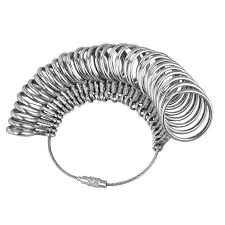 Silver ring sizer on white background