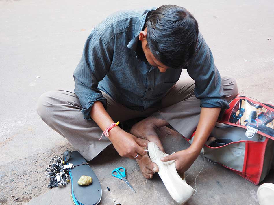 Pushkar India Mending Shoes