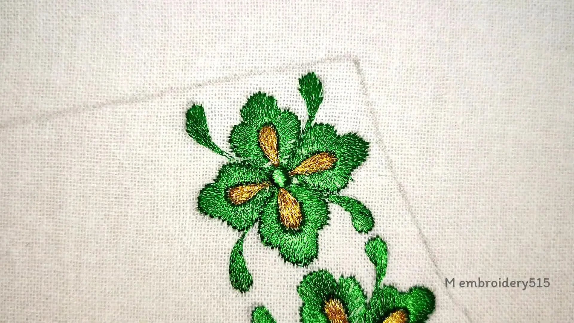 Completed machine embroidered floral design on a neckline.