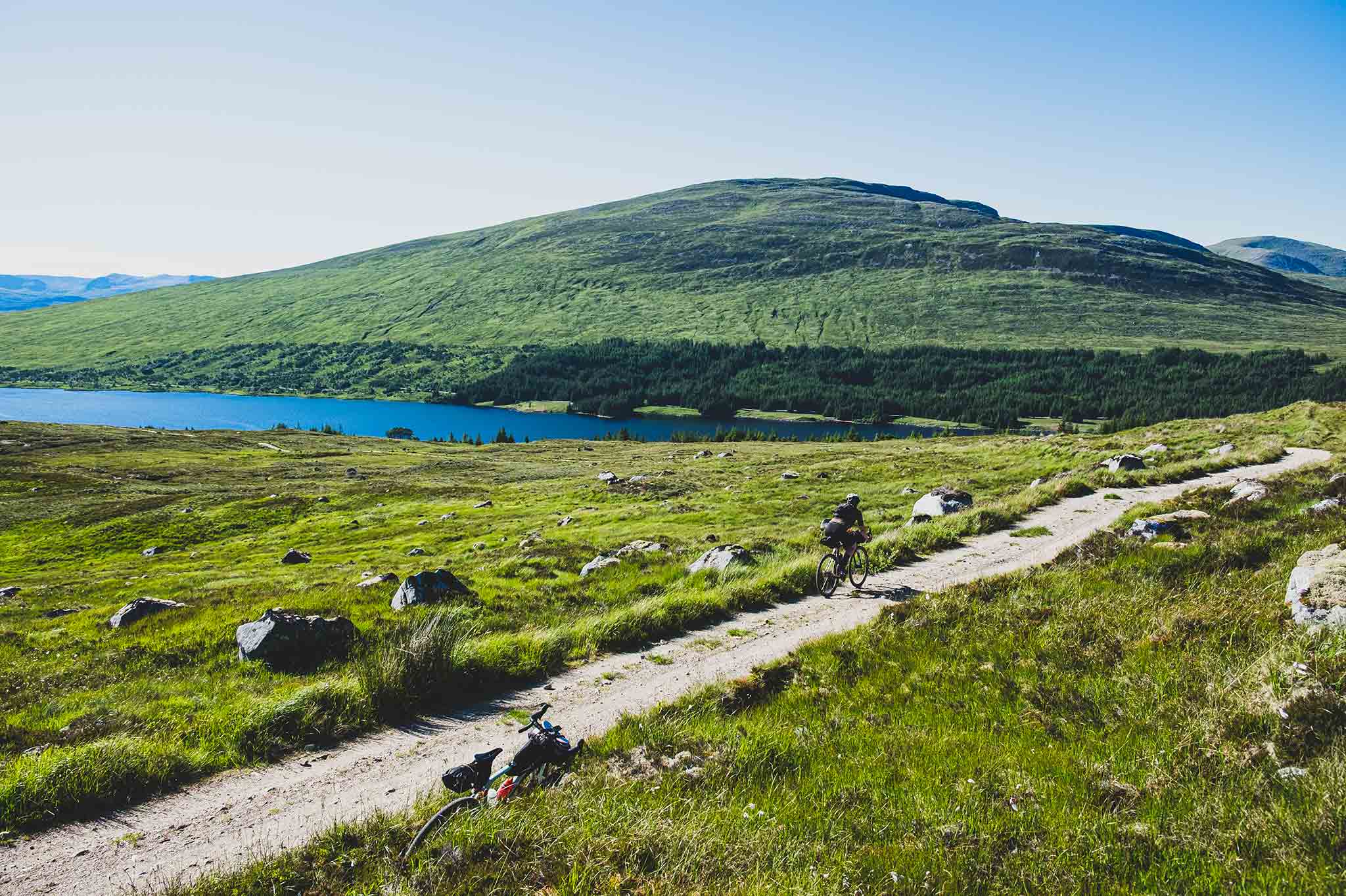 Marcus Nicolson is an adventure cyclist based in Glasgow, Scotland. He has just broken the Fastest Known Time for the Badger Divide, wearing QUOC's Gran Tourer Grave Cycling Shoe. 