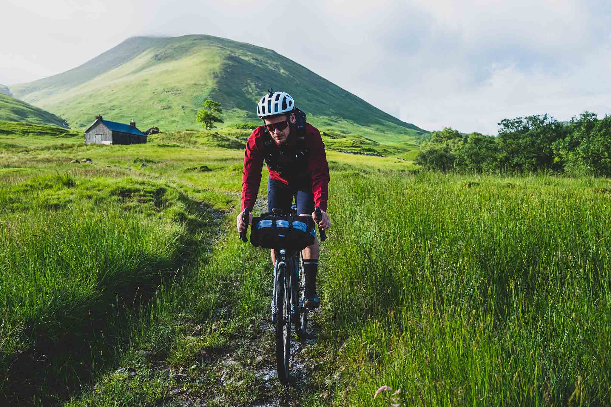 Marcus Nicolson is an adventure cyclist based in Glasgow, Scotland. He has just broken the Fastest Known Time for the Badger Divide, wearing QUOC's Gran Tourer Grave Cycling Shoe. 