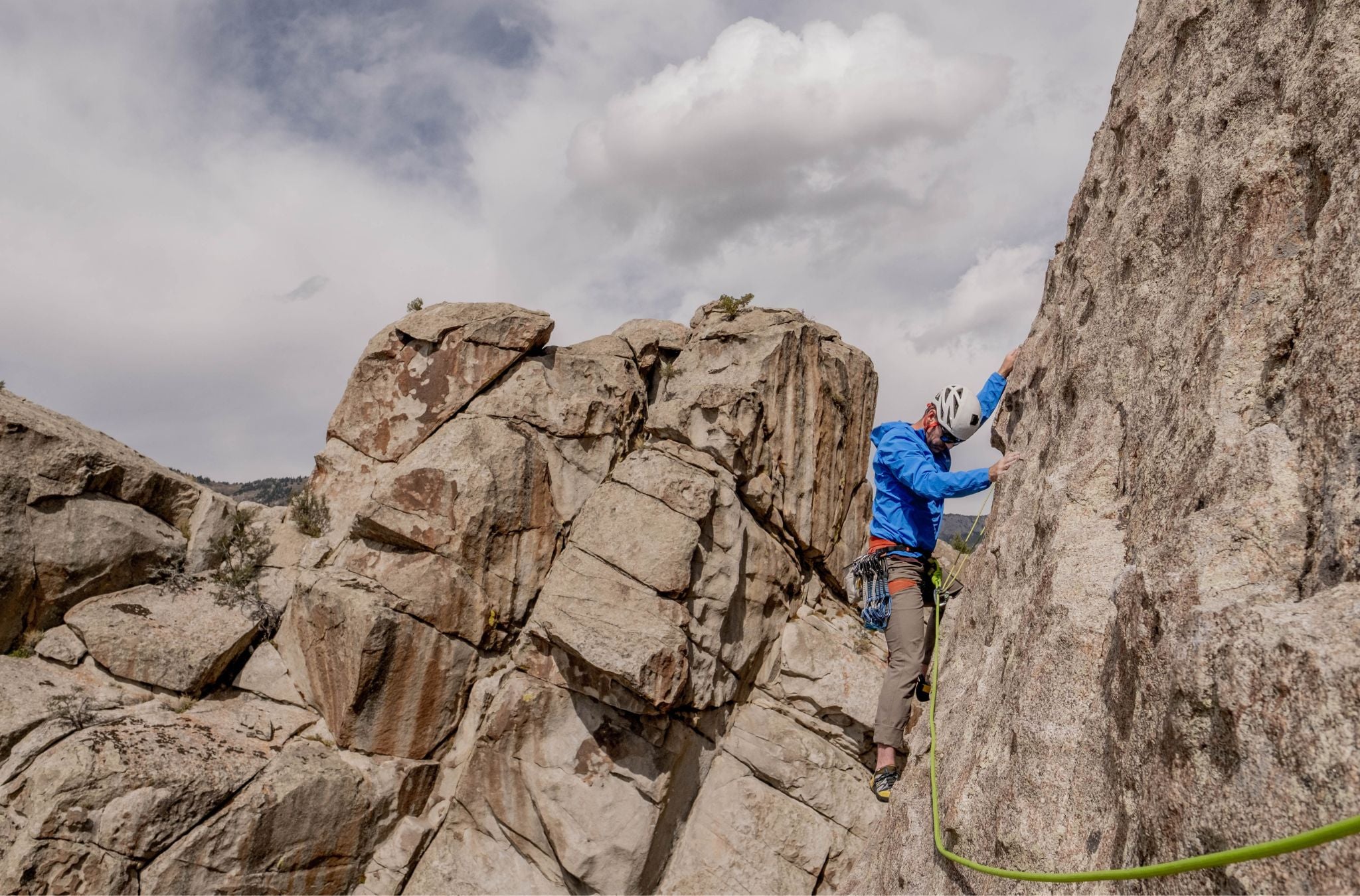 Matt Walker climbing an outdoor rock face