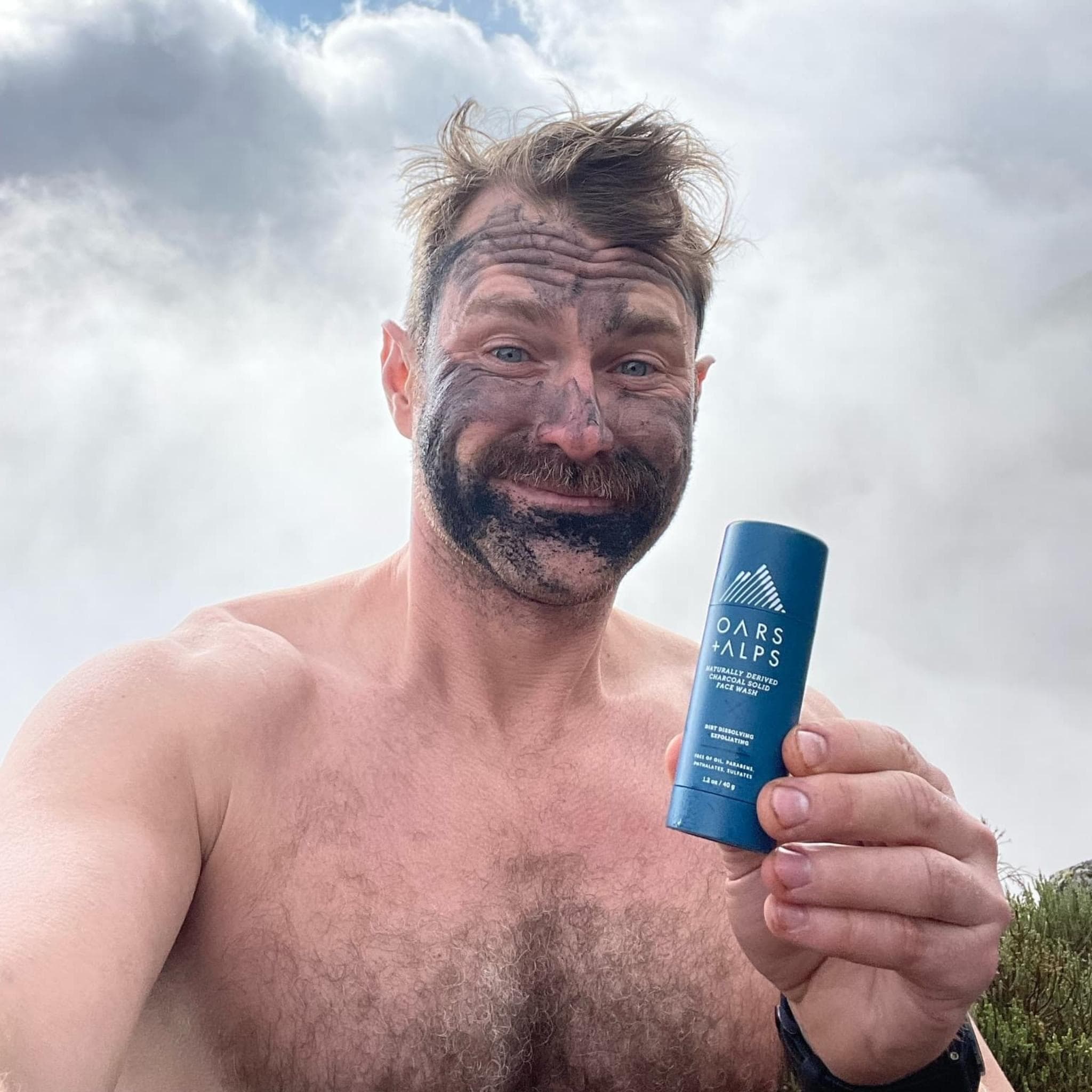 Man using Oars + Alps Solid Charcoal Face Wash