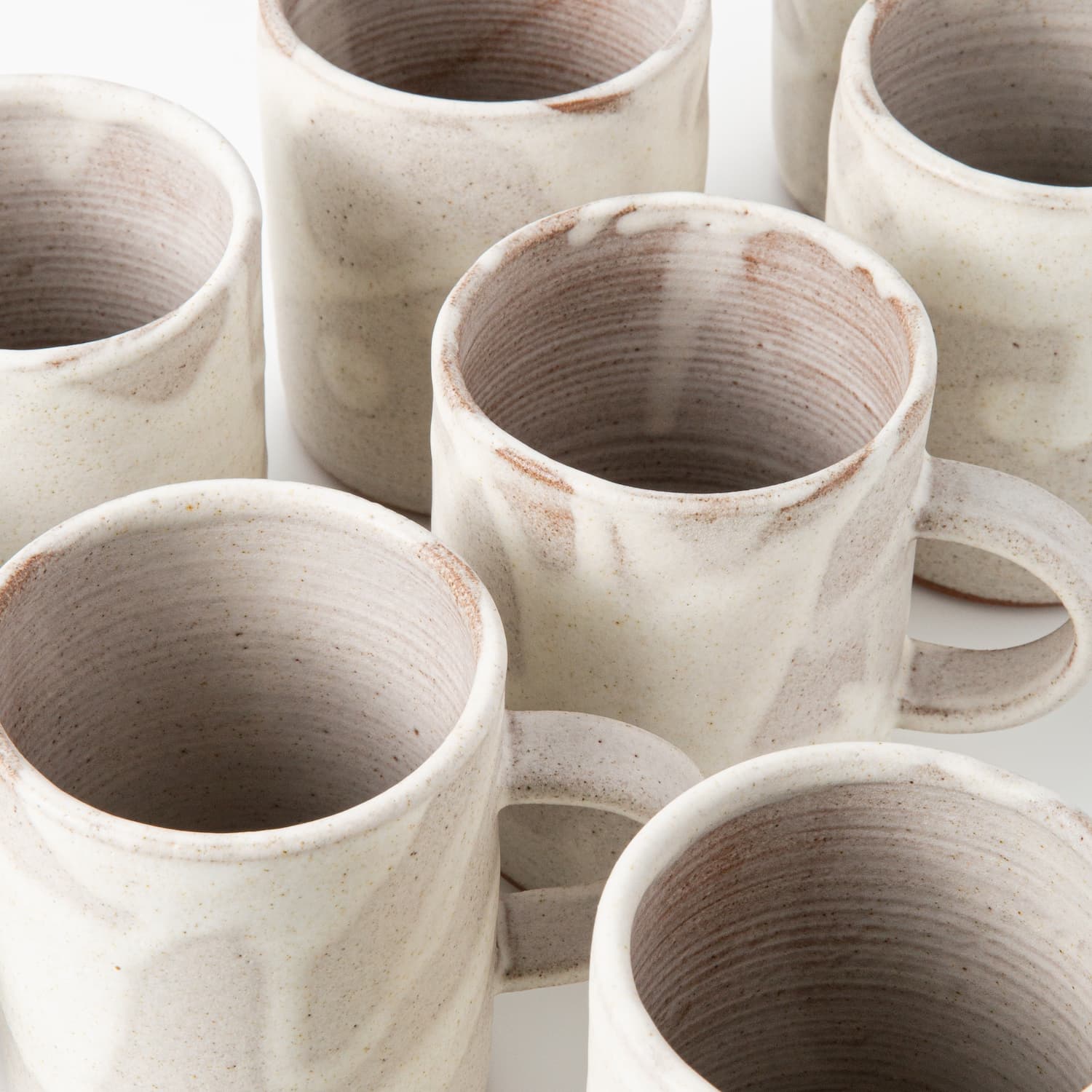 Handmade artisan ceramic mug in white matte glaze by Eren Armitage