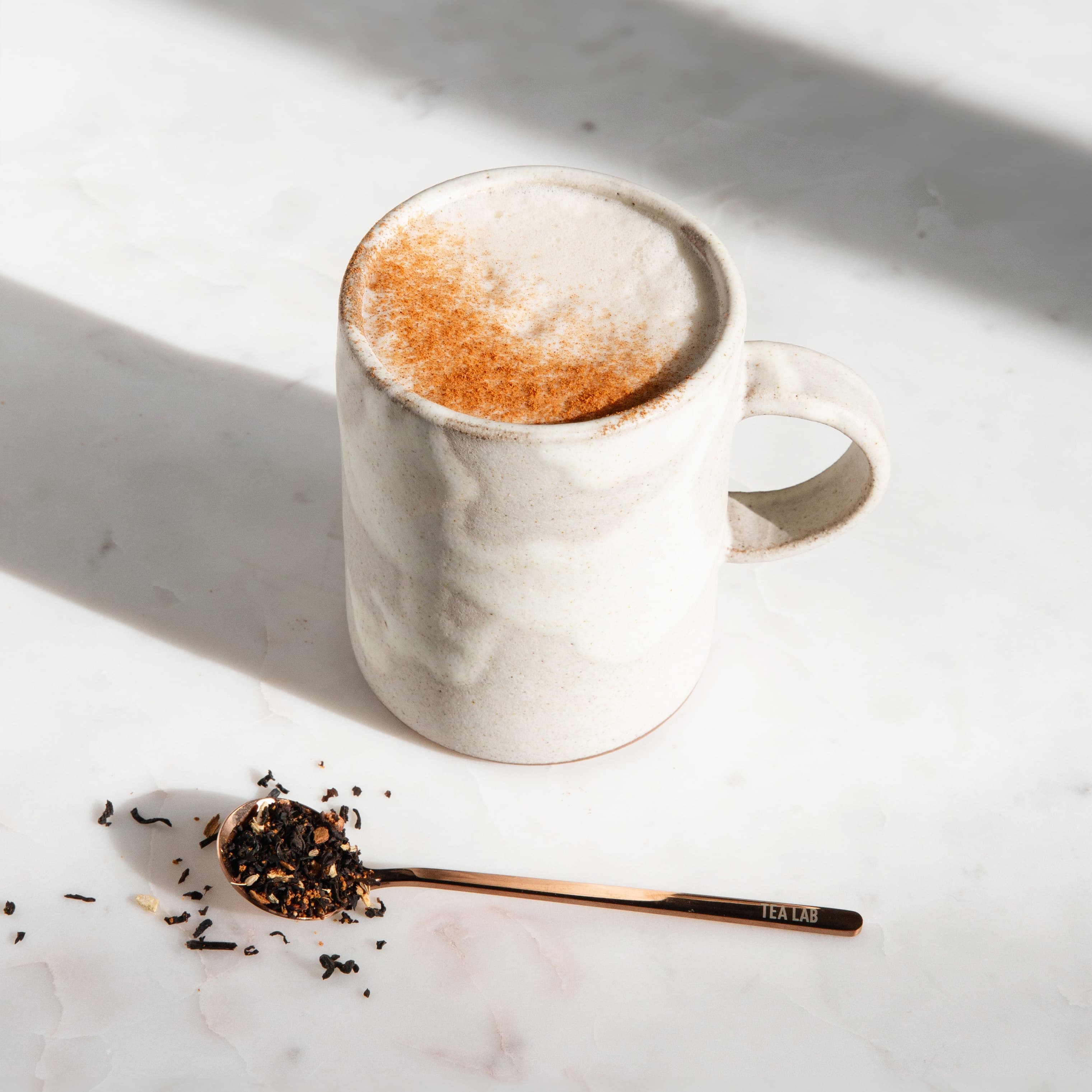 Gingerbread black tea latte with cinnamon
