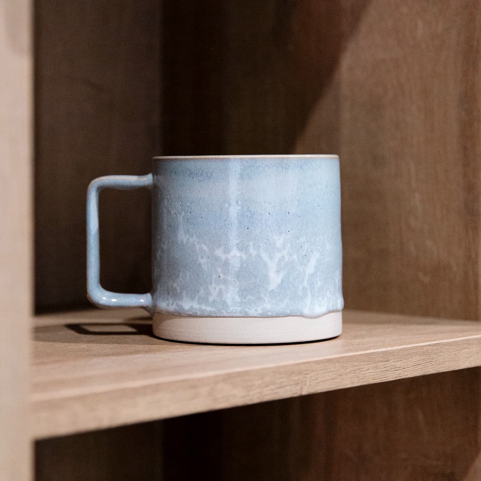 Handmade ceramic mug in dorset blue reactive glaze