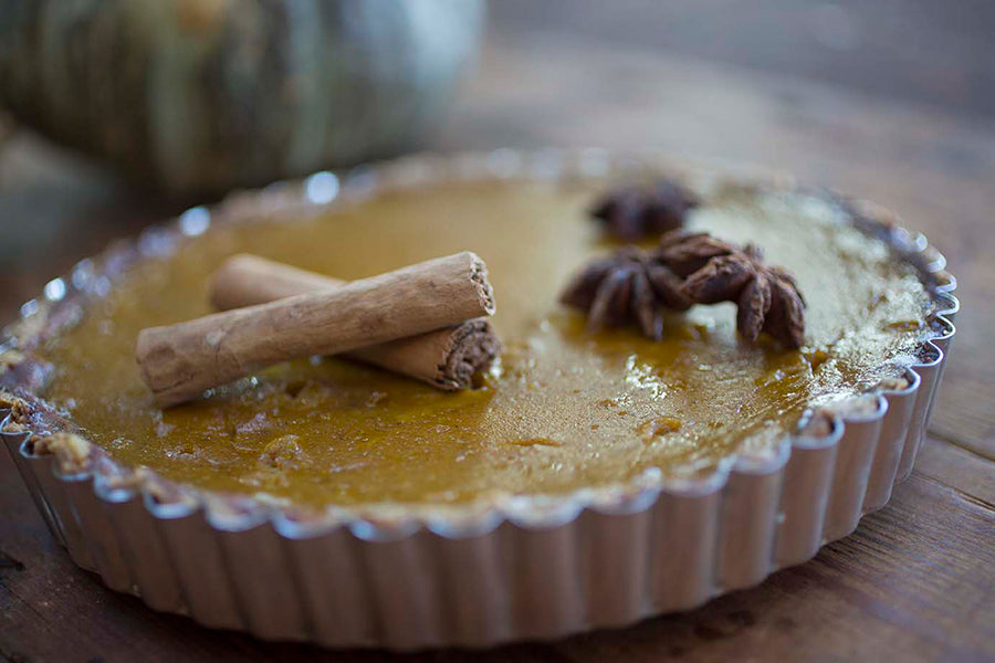 EPIC Pork Crackling Pumpkin Pie close up on wooden table.