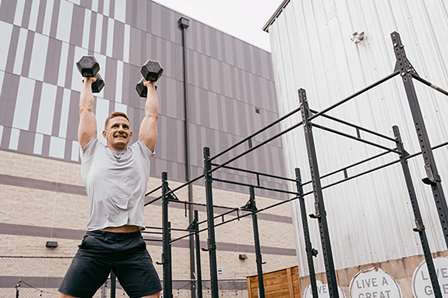 Brent Fikowski lifting barbells at a CrossFit gym