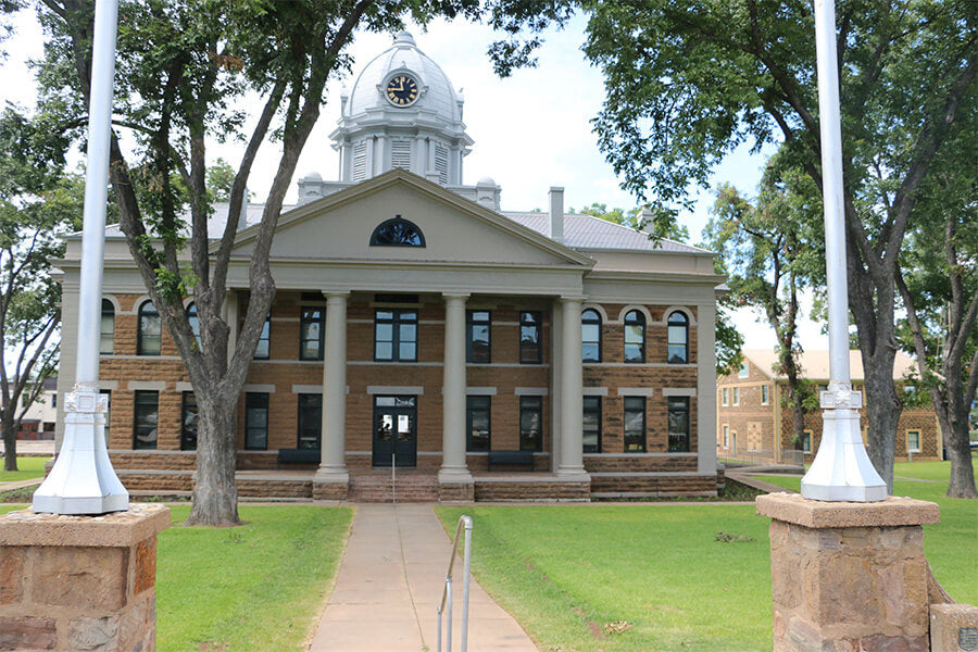 Built in 1909, the Mason County Courthouse stands at the center of the tree-lined town square. 