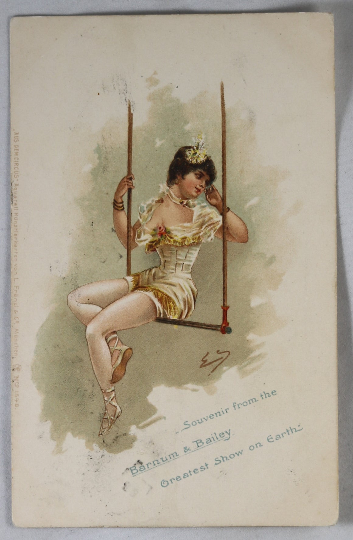 1902_Barnum_and_Bailey_trapeze_artist_postcard_1_580x2x
