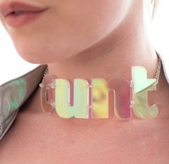 C-U-N-T- Choker worn around a model's neck.