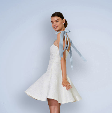 Bride wearing casual simple bridal shower and wedding reception dress with Blue Ribbon straps for second outfit