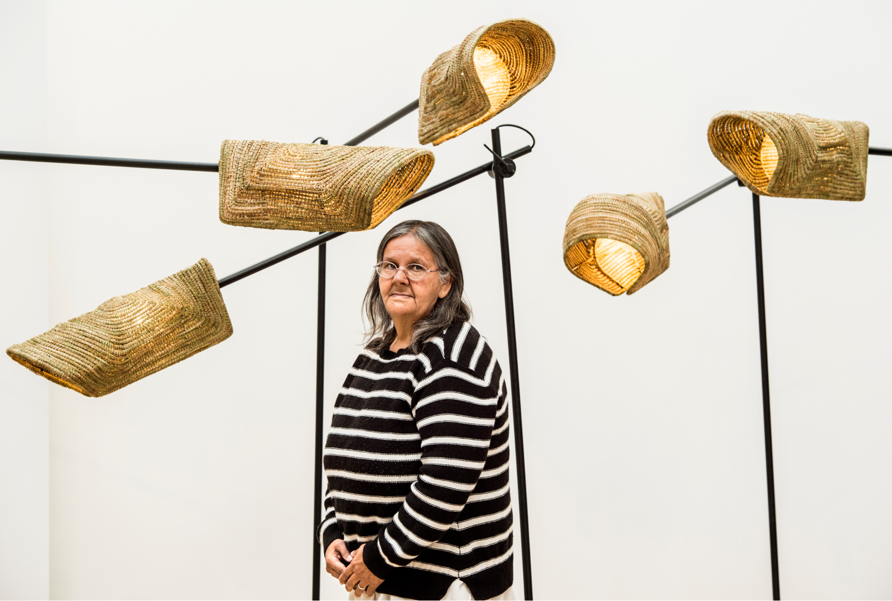 Aunty Ellen with her woven floor lamps - Ngalya 2019