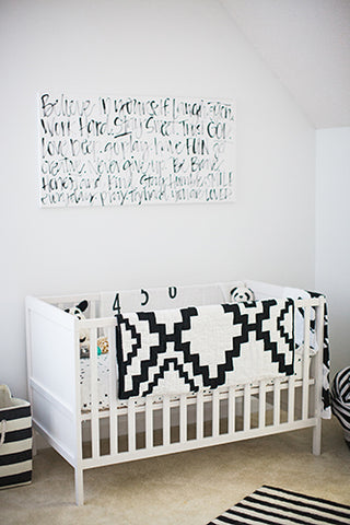 black and white nursery crib